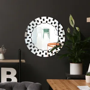 Modern geometric acrylic wall mirror with decorative cut-out frame for living room home decor.