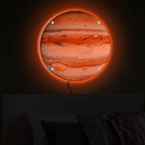 Round 3D LED Jupiter wall lamp with warm glow halo, perfect creative night light for bedroom decor.
