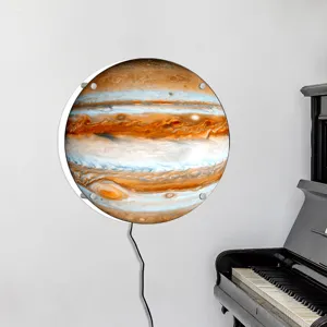 Round 3D LED Jupiter planet wall lamp, creative night light home decor detail view.