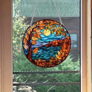 Round stained glass hanging suncatcher with autumn tree scenery window art decor piece for home.