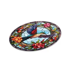 Detailed close-up of the exquisite stained glass hummingbird wall decoration art piece.