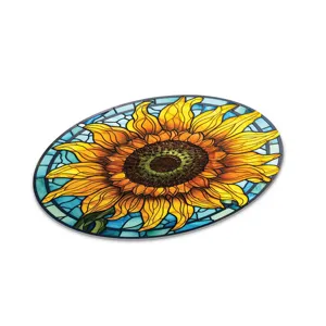 Oval stained glass sunflower wall art detail, vibrant floral decor for home interior.