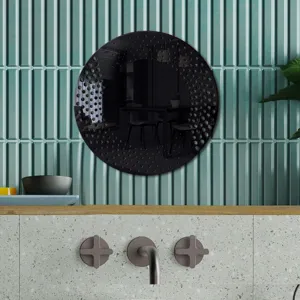 Round black acrylic decorative wall mirror sticker with modern dot perforated edge design for home decor.
