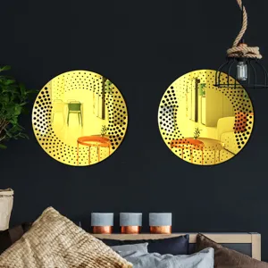Decorative round wall mirror set with stylish black dot pattern for modern home interior decor