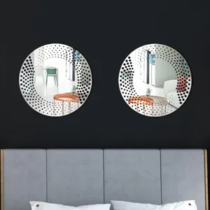 Modern round acrylic wall mirror stickers with black polka dot design for home decor detail.