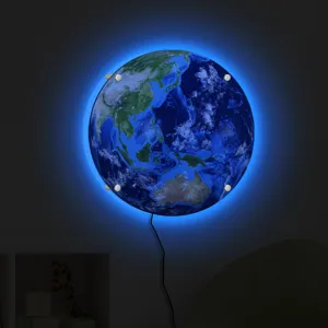 LED Earth wall lamp detail, glowing night light with vibrant blue backlight and round design.