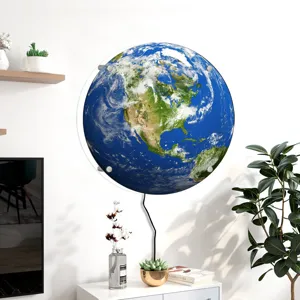 Detail view of a glowing earth wall lamp mounted in a bright modern home room setting.