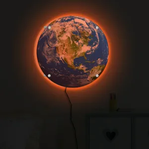 Illuminated 3D LED earth wall lamp with warm glow, creative planet night light for bedroom decor.