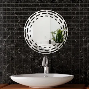 Round decorative wall mirror with hollowed border design, modern acrylic home decor sticker.