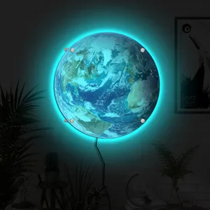 Detailed view of the 3D LED glowing earth wall lamp creating stunning blue light in a cozy room.