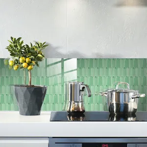 Detail of kitchen wall tile sticker featuring a stylish peacock feather pattern for home decor.