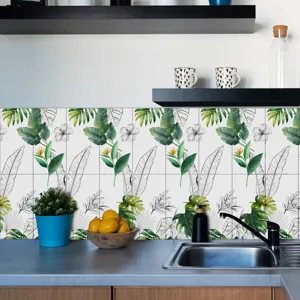 Adesivi per piastrelle impermeabili con motivi a foglie tropicali per paraschizzi da cucina.