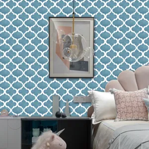 Detailed view of blue and white Moroccan trellis self adhesive tile sticker in cozy bedroom decor.