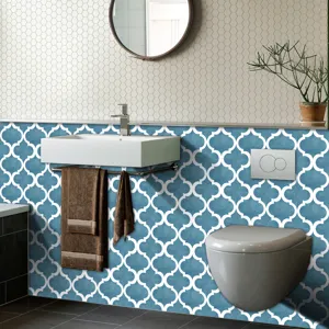 Blue and white Moroccan tile stickers creating a modern bathroom style effortlessly.
