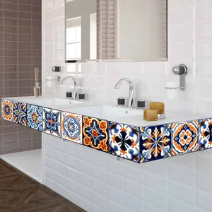 Moroccan style tile stickers detail view, vibrant blue and orange floral wall decor pattern.