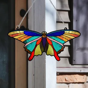 Detailed close-up shot of the colorful acrylic butterfly hanging decoration on outdoor porch.