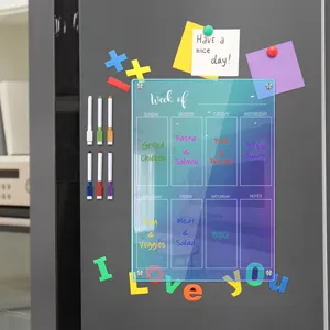 Acrylic magnetic weekly planner board for refrigerator with dry erase markers and notes.