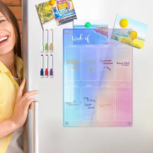 Clear acrylic magnetic weekly planner board for refrigerator with dry erase markers and daily notes.