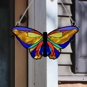 Detailed view of a vibrant stained glass style butterfly hanging ornament for home decor.
