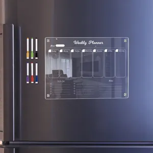 Clear acrylic weekly planner magnetic dry erase board for refrigerator with pens.