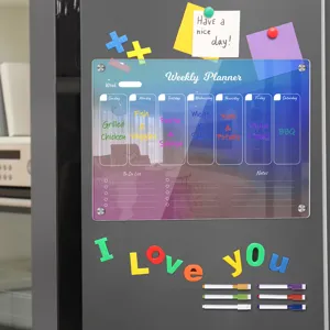 Detailed view of the colorful acrylic weekly planner magnetic board on fridge with clear layout.
