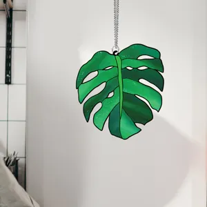 Monstera leaf acrylic suncatcher hanging ornament for home wall decor detail view pendant