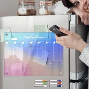 Transparent acrylic magnetic weekly planner board for refrigerator with colorful markers.