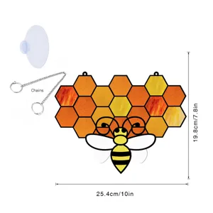 Stained glass bee honeycomb hanging ornament detail, showing metal chain and suction cup accessories.