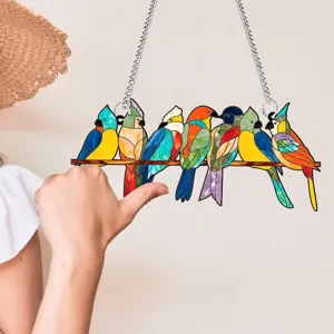Stained acrylic bird suncatcher detail, colorful hanging decor for window and wall display.