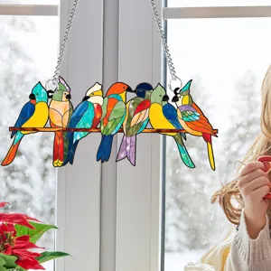 Colorful acrylic bird window hanging detail, stained glass style branch decor, suncatcher.