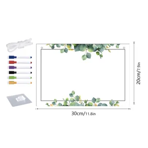 Acrylic hanging dry erase board detail view with eucalyptus leaf design and marker set.