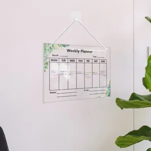 Clear acrylic weekly planner board hanging message board for home office wall organization.