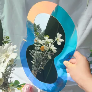 Miroir mural acrylique holographique irrégulier avec dégradé bleu et orange pour la décoration