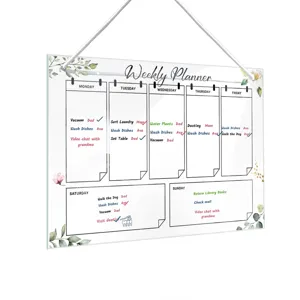 Acrylic weekly planner dry erase board with floral design and hanging cord for wall organizer.