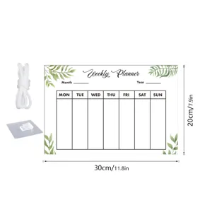 Acrylic weekly planner hanging board with dry erase memo calendar and green leaves design.