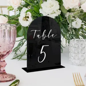 Arch black acrylic table number sign for wedding decor, DIY tabletop card display detail.