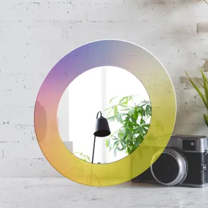 Vue détaillée du miroir décoratif rond en acrylique iridescent avec effet de dégradé coloré.