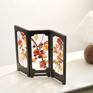 Detailed view of miniature wooden 3-panel folding screen featuring translucent fruit pattern.