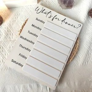 Tableau de menu hebdomadaire en bois avec curseurs de suivi des repas pour décoration de cuisine.