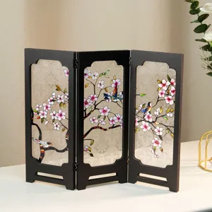 Detailed view of the mini retro wooden folding screen with delicate cherry blossom and bird art.