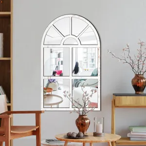Decorative arched window mirror wall decor showcasing detailed home interior placement design.