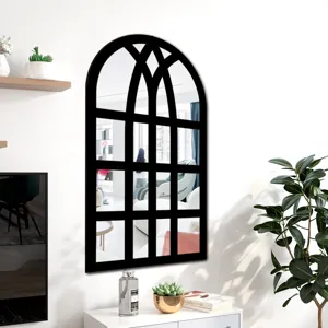 Arched window wall mirror detail, black frame decorative mirror for living room wall decor.