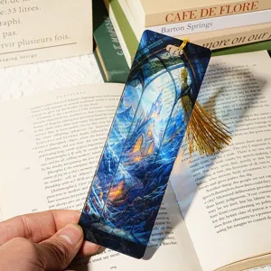 Acrylic dragon bookmark detail, translucent stained glass castle design with gold tassel.