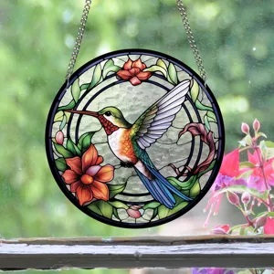Detailed view of the stained glass hummingbird suncatcher hanging gracefully by the window.
