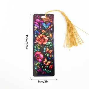 Colorful acrylic stained glass bookmark with butterfly floral design and gold tassel.