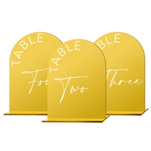 Gold arched acrylic wedding table number signs set, modern mirror finish place card displays.