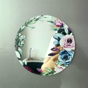 Espejo magnético redondo para taquilla con estampado floral de acuarela y hojas verdes.