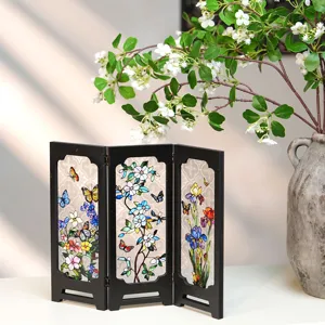 Detail of miniature folding screen, vintage stained glass floral butterfly desktop ornament.