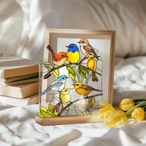 Stained glass style acrylic bird table ornament detail view, colorful birds on tree branches.
