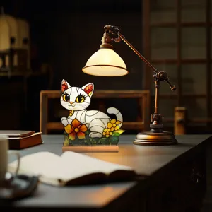 Exquisite stained glass acrylic cat desktop ornament, floral design home decor detail shot.
